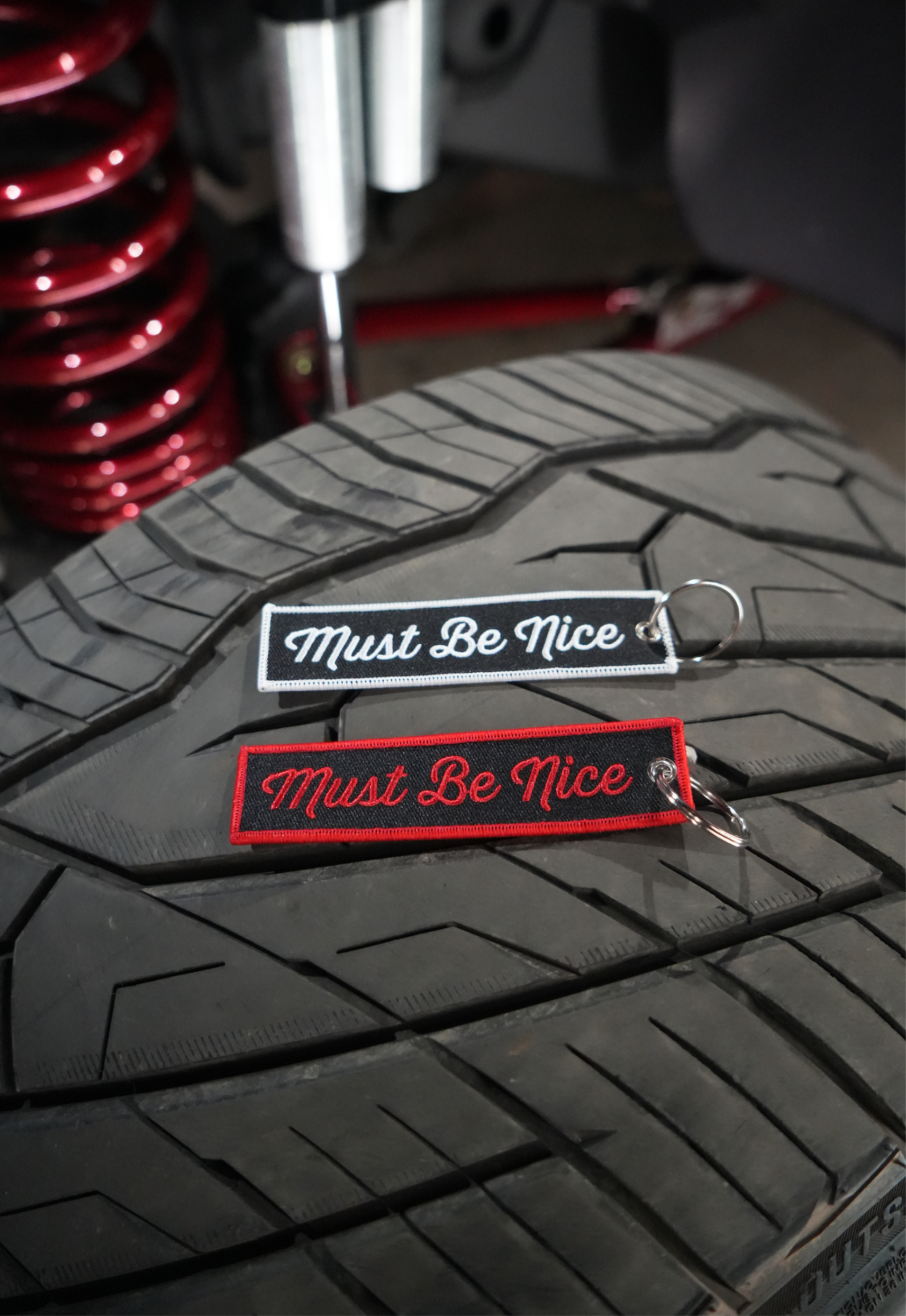 "Must Be Nice" Keychains image 0